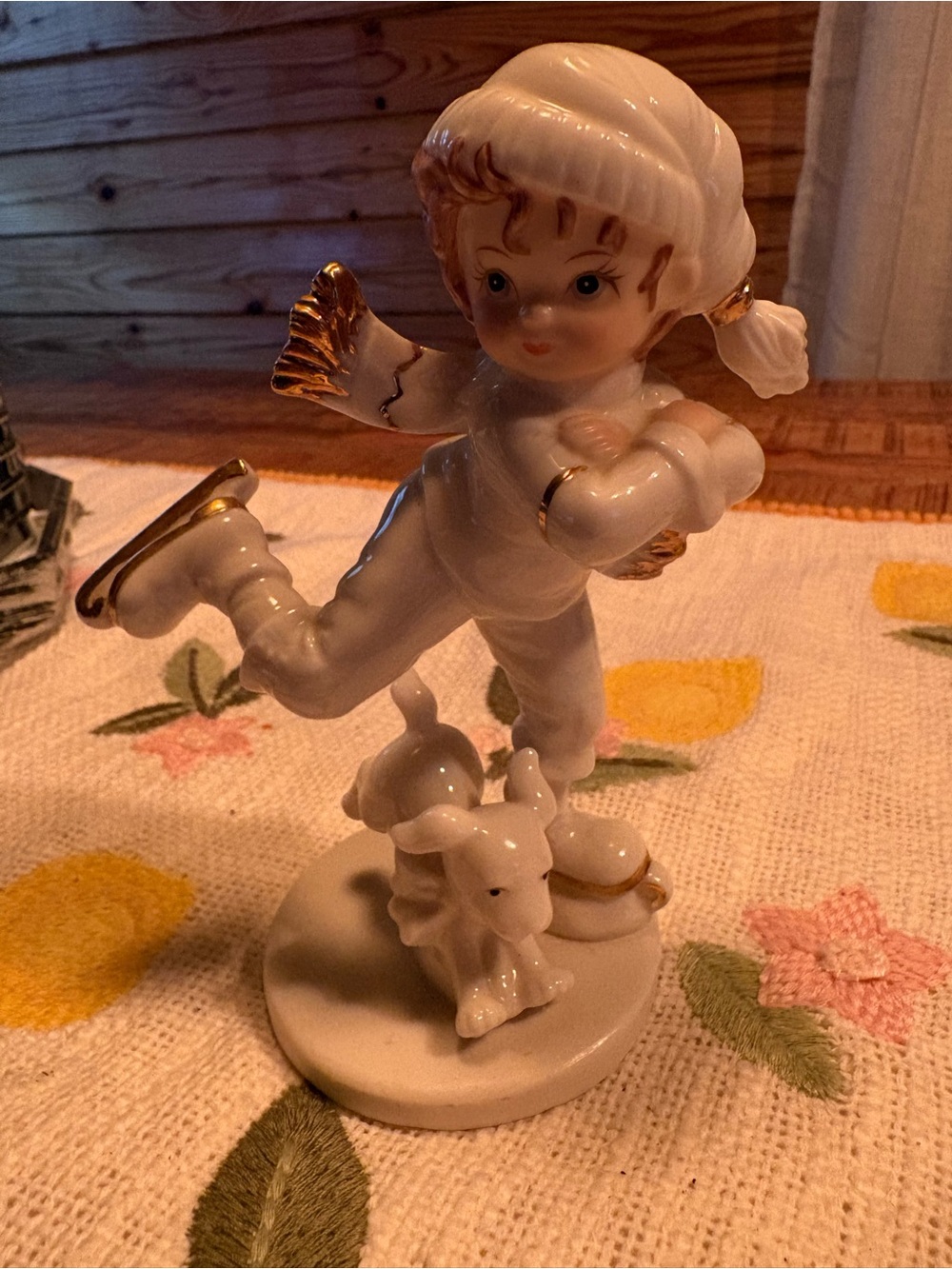 Cream Porcelain Ice Skater Figurine with Gold Accents